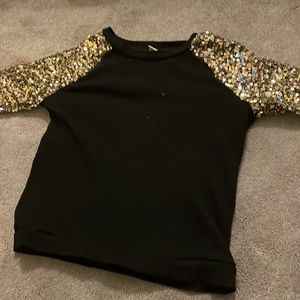 Black shirt with glittery sleeves